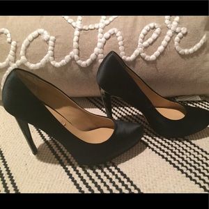 Black BCBGMaxAzria platform pumps. Worn once